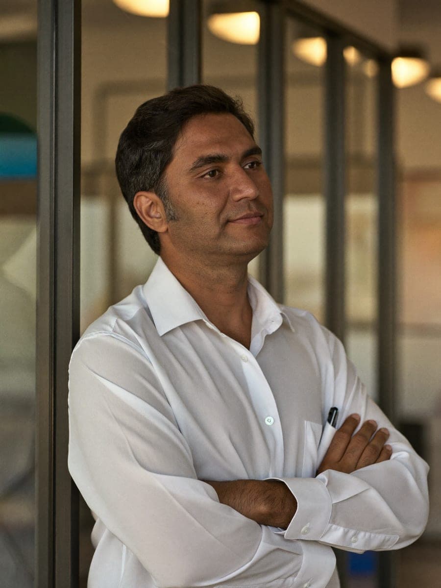 A banking compliance professional in a modern office